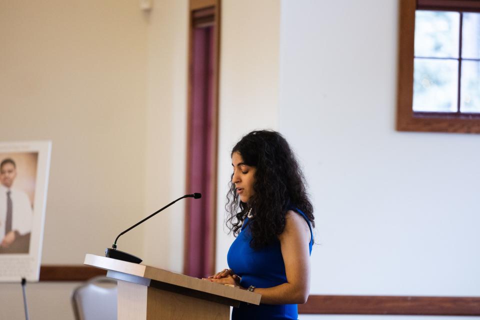 Nadia Yahyapour, a graduate of the University of Utah, speaks during the One Refugee graduation celebration at the Garden Place at Heritage Park in Salt Lake City on May 8, 2023. | Ryan Sun, Deseret News