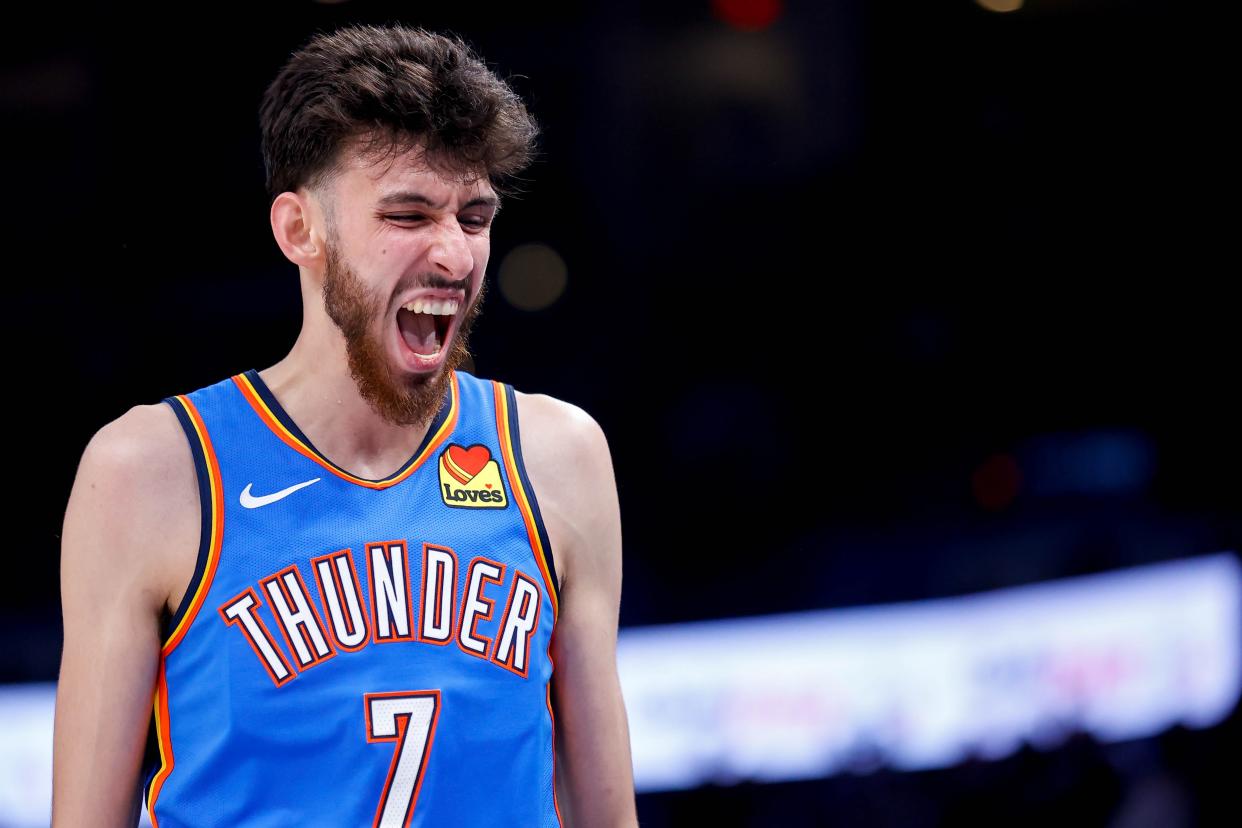 Oklahoma City forward Chet Holmgren (7) opens and closes his mouth after getting fouled in the face in the second quarter during an NBA basketball game between the Oklahoma City Thunder and the Utah Jazz at the Paycom Center in Oklahoma City, on Wednesday, March 20, 2024.