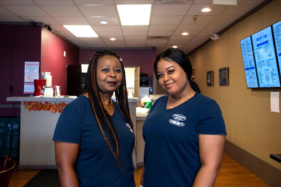 Sandra Cabbell, owner of Anchors Away restaurant, and her daughter, Jasmine Moore, stand inside the newly opened Peoria location on Knoxville Avenue on Oct. 20, 2021.