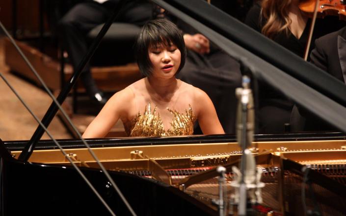 'Music, in the Chinese mind, is the most sublime thing you can do': world-famous pianist Yuja Wang performing in 2018 - Hiroyuki Ito/Getty Images
