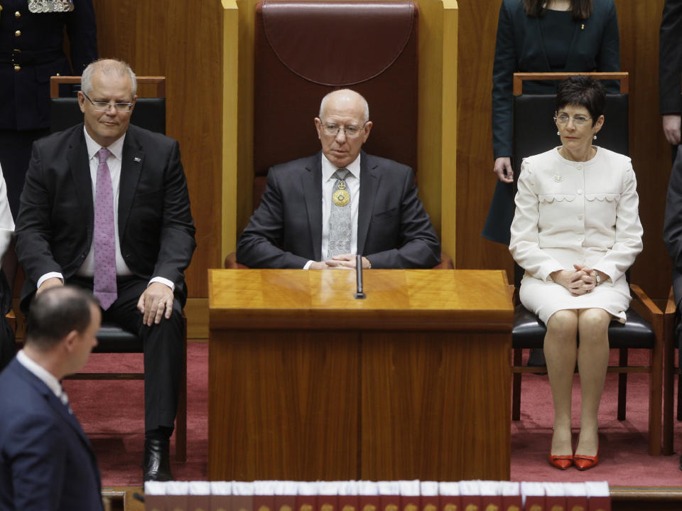 Former soldier David Hurley, center, is sworn in as Australia’s governor-general at a ceremony in Parliament House in Canberra Monday, July 1, 2019. Hurley will officiate on Tuesday when Parliament resumes for the first time since Prime Minister Scott Morrison's conservative government was elected to a third three-year term. (AP Photo/Rod McGuirk)