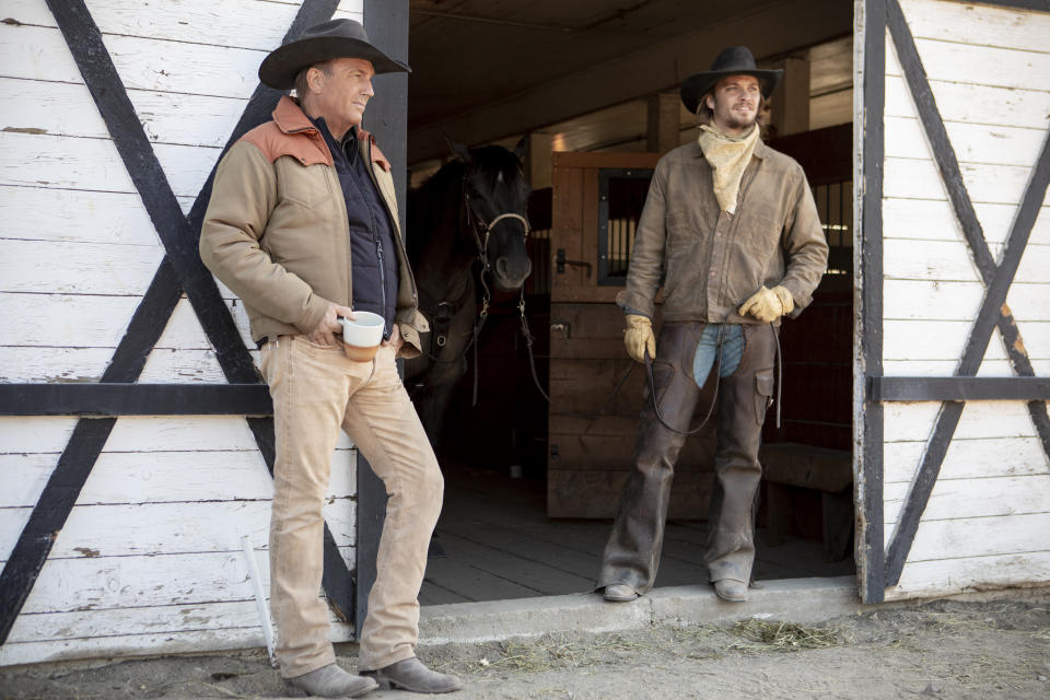 John Dutton (R- Kevin Costner) hands over the reigns to the Ranch to his youngest son Kayce (L-Luke Grimes) Season 2 of "Yellowstone" returns to Paramount Network starting Wednesday, June 19 at 10 PM, ET/PT.