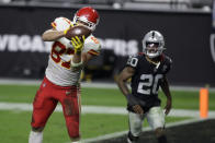 Kansas City Chiefs tight end Travis Kelce (87) catches a pass for a touchdown against the Las Vegas Raiders during the second half of an NFL football game, Sunday, Nov. 22, 2020, in Las Vegas. (AP Photo/Isaac Brekken)