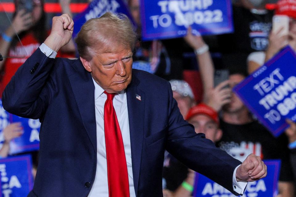 Trump dances at his rally in Erie , Pennsylvania on September 29 (REUTERS)