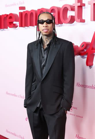 <p>Monica Schipper/Getty</p> Tyga