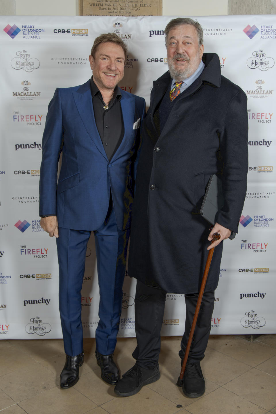 Simon Le Bon and Stephen Fry attend The Fayre of St. James's in support of The Quintessentially Foundation & The Firefly Project at St James's Church on November 28, 2023 in London, England. (Photo by Shane Anthony Sinclair/Getty Images)