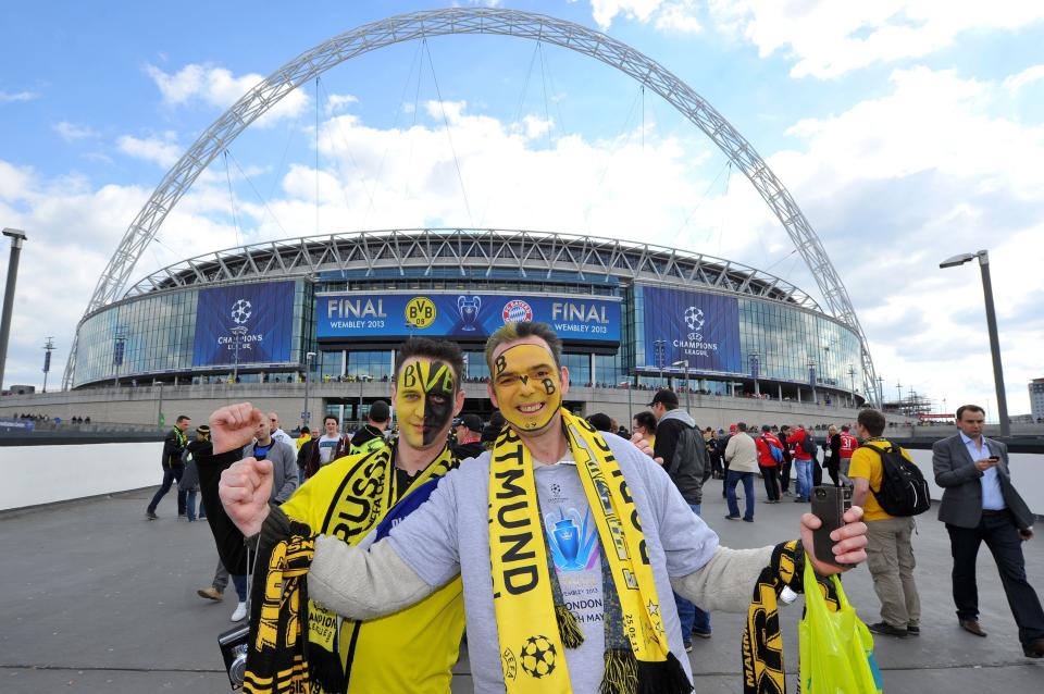 Borussia Dortund fans arrive for the UEFA Champions League Final at Wembley Stadium, London.