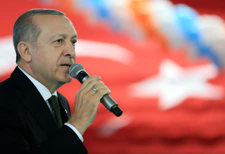 Turkish President Tayyip Erdogan speaks during a meeting of his ruling AK Party in Trabzon, Turkey March 25, 2018. Murat Cetinmuhurdar/Presidential Palace/Handout via REUTERS