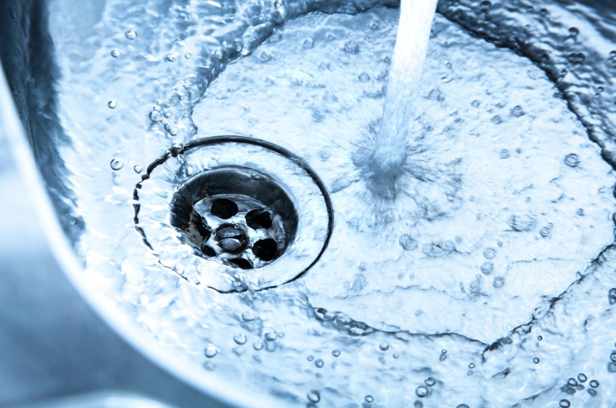 Water treatment doesn't have to be one large, citywide system. <a href="https://www.gettyimages.com/detail/photo/kitchen-sink-with-running-water-royalty-free-image/168583229" rel="nofollow noopener" target="_blank" data-ylk="slk:Deepblue4you/E+ via Getty Images;elm:context_link;itc:0;sec:content-canvas" class="link ">Deepblue4you/E+ via Getty Images</a>