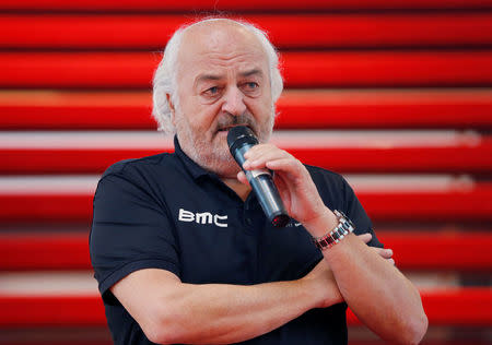 FILE PHOTO: BMC Racing Team's owner Andy Rihs of Switzerland speaks during the cycling team's official presentation in Nazareth, near Ghent January 11, 2013. REUTERS/Francois Lenoir/File Photo