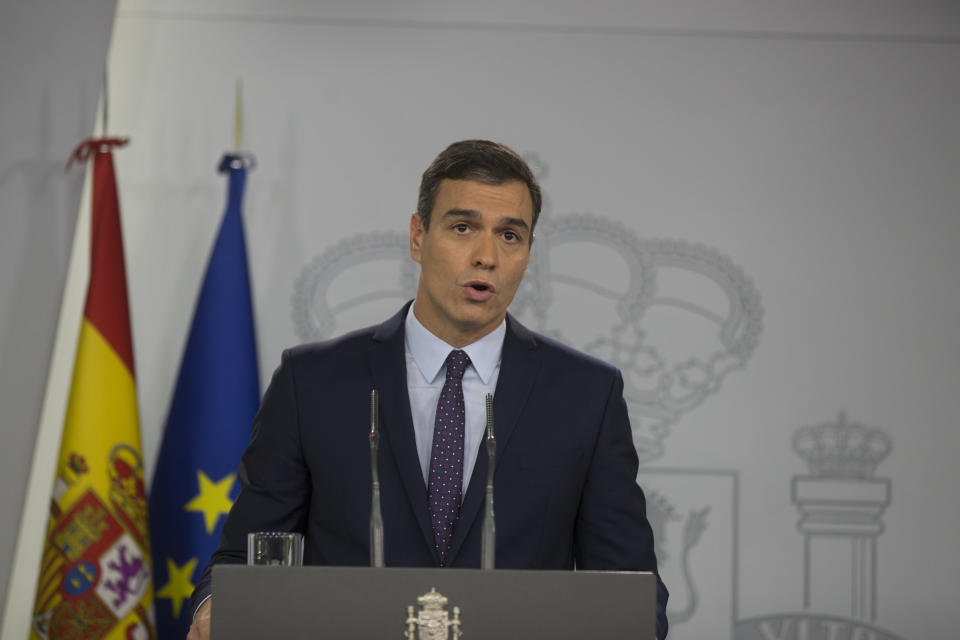 Spain caretaker Prime Minister Pedro Sanchez reads a statement at the Moncloa Palace in Madrid, Spain, Monday, Oct. 14, 2019. Spain's Supreme Court Monday convicted 12 former Catalan politicians and activists for their roles in a secession bid in 2017 in a bombshell ruling that is likely to inflame independence supporters in the wealthy northeastern region. (AP Photo/Paul White)