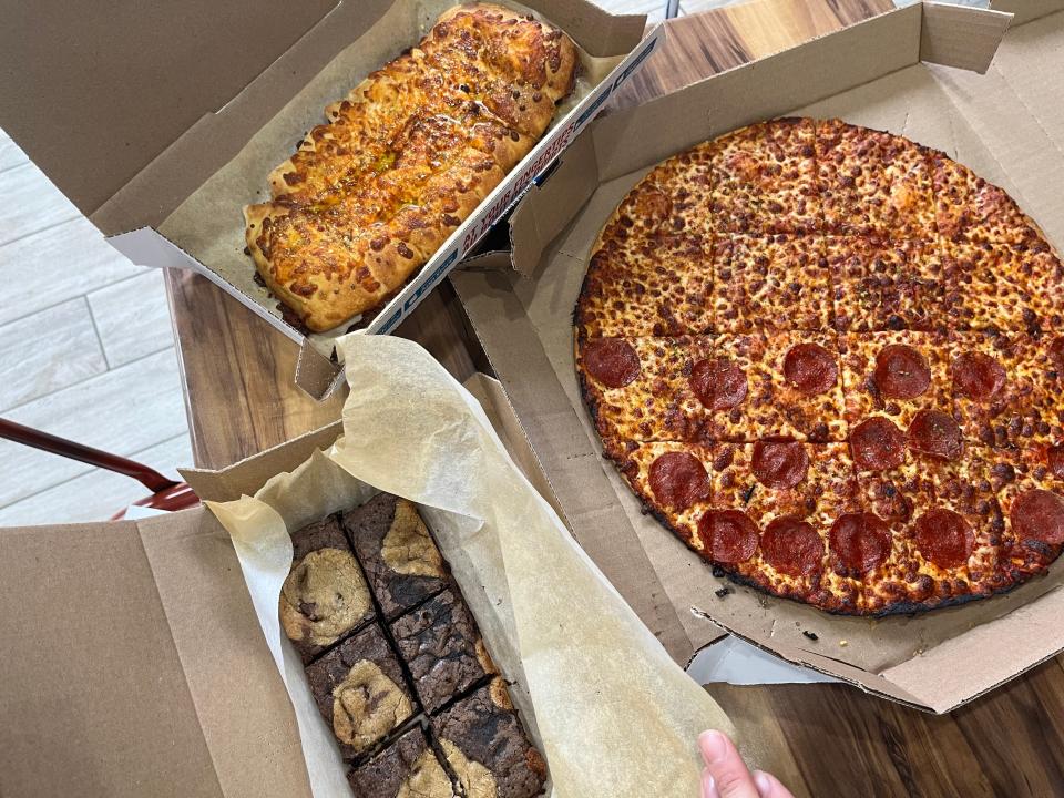 Domino's pizza, brownies and cheese bread