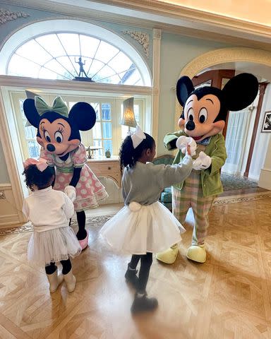 <p>Vanessa Bryant/Instagram</p> Vanessa Bryant's daughters meet Mickey Mouse and Minnie Mouse at Disneyland on Easter