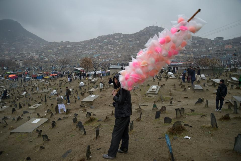A vendor sells candy floss in Kabul on March 21, 2017, during Nowruz festivities that mark the Afghan New Year.