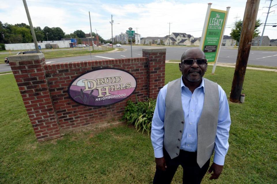 Darryl Gaston stands near a Druid Hills neighborhood sign near Norris Avenue and Statesville Avenue on Tuesday, August 1, 2017. Gaston grew up in Druid Hills and lives in his grandmother’s house. He’s a fierce advocate for the neighborhood, and is trying to encourage people to hold onto their houses and stay in the area. He’s trying to hold together a neighborhood that’s changing fast. The North End, as it’s been dubbed, is changing fast. A torrent of development and new residents are poised to dramatically reshape a collection of some of Charlotte’s oldest and most prominent black neighborhoods. Some neighbors are trying to prevent that, while also trying to work for some of the benefits from new development and more resources coming to the community.