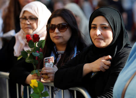 People take part in a vigil for the victims of an attack on concert goers at Manchester Arena, in central Manchester, Britain May 23, 2017. REUTERS/Peter Nicholls