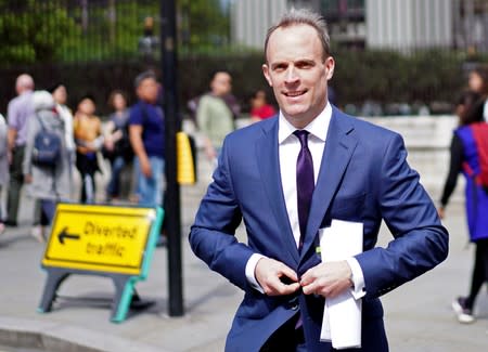 Dominic Raab, leadership candidate for Britain's Conservative Prime Minister walks near the Parliament grounds in London