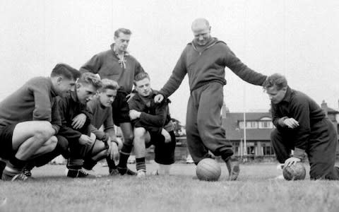 Sir Matt Busby with his young stars who became known as the 'Busby Babes' - Credit: PA