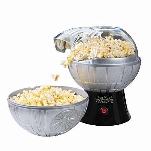 <p><strong>Uncanny Brands</strong></p><p>amazon.com</p><p><strong>$59.99</strong></p><p>That's no moon — it's a Star Wars air-popped popcorn maker! Fire it up every time you want to re-watch the saga. </p>