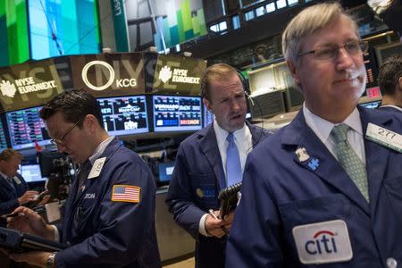 Traders work on the floor of the New York Stock Exchange June 3, 2014. REUTERS/Brendan McDermid