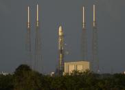 The unmanned Space Exploration Technologies' Falcon 9 rocket is seen before liftoff at Cape Canaveral, Florida November 28, 2013. The SpaceX launch was aborted one minute before liftoff on Thursday due to an unexplained technical issue, company officials said. It was the second attempt this week to launch a communications satellite for SES, which operates the world's second largest fleet. REUTERS/Michael Brown (UNITED STATES - Tags: BUSINESS SCIENCE TECHNOLOGY)