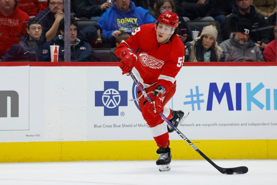 Red Wings left wing Tyler Bertuzzi takes a shot in the second period of the Wings' 5-4 shootout loss on Wednesday, Nov. 30, 2022, at Little Caesars Arena.