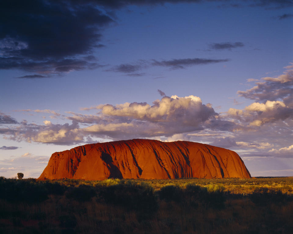 Walkers have flocked to Uluru to climb it before its closure on October 26. Source: AAP