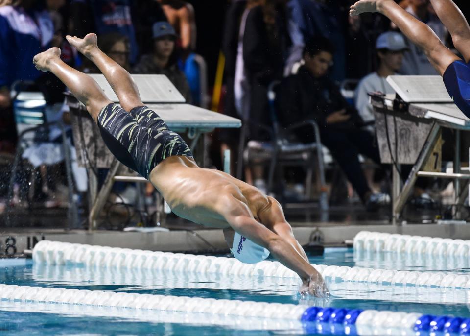 Bolles' Andy Kravchenko races in the boys 50-yard freestyle at the 2022 Class 1A championships in Stuart.