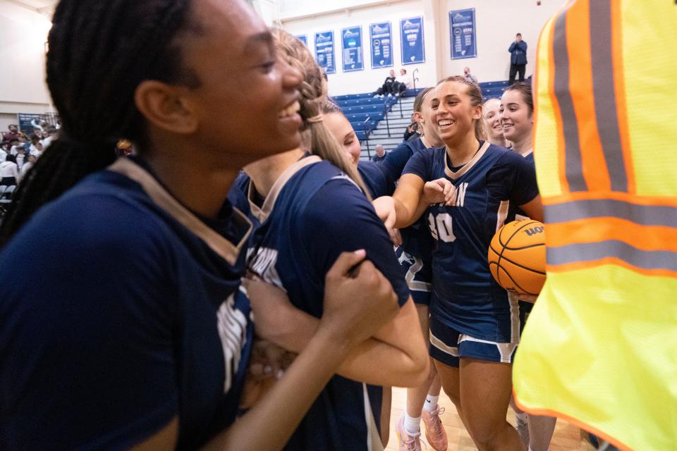 Feb 16, 2024; Hackettstown, NJ, USA; Pope John vs. Voorhees in the Hunterdon/Warren/Sussex Girls Basketball Tournament final at Centenary University gym. Pope John celebrates defeating Voorhees.