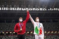 <p>L'Italien Gianmarco Tamberi et le Qatari Mutaz Essa Barshim ont décidé de se partager l'or, en saut en hauteur, dimanche.</p>