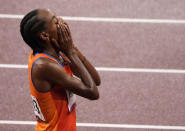 Sifan Hassan, of Netherlands celebrates after winning the gold medal in the final of the women's 5,000-meters at the 2020 Summer Olympics, Monday, Aug. 2, 2021, in Tokyo, Japan. (AP Photo/Charlie Riedel)