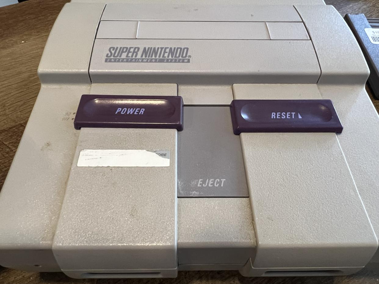 This SNES console has scratches and discoloring, but it's in far better shape than a number of systems out there. (Image: Howley)