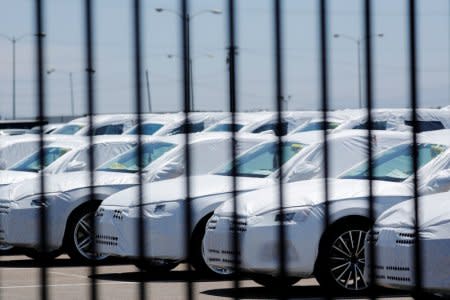 FILE PHOTO - Audi vehicles sit waiting for delivery after their arrival in the United States in National City, California, U.S. June 27, 2018.        REUTERS/Mike Blake