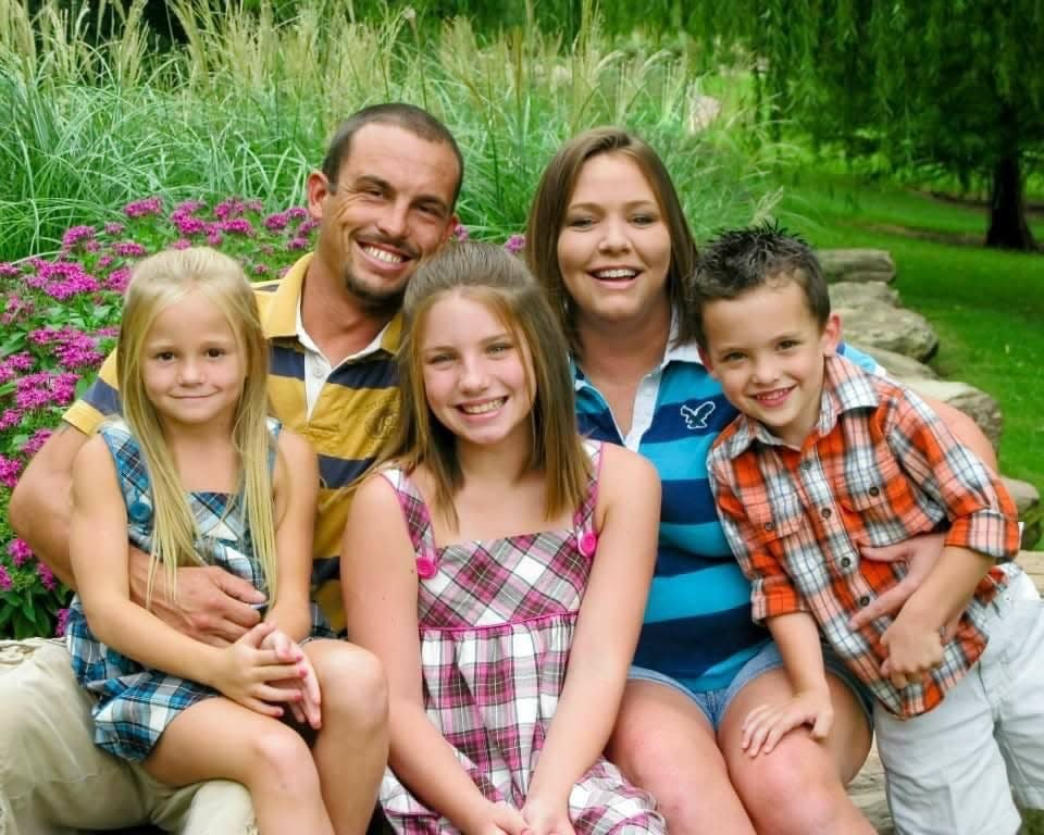 Rocky Buckley with his wife, Crystal Buckley, and their children during better times. Rocky Buckley was shot and killed July 26, 2012.