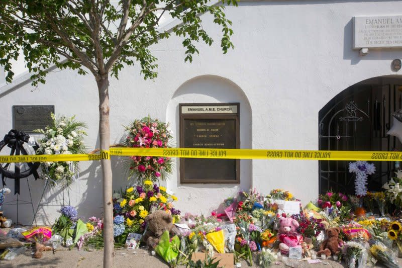 A memorial is erected outside the Emanuel African Methodist Episcopal Church on June 19, 2015 in memory of the the nine people killed in a June 17 shooting inside the church. Dylann Roof, 21, was arrested in connection with the shootings. File Photo by Kevin Liles/UPI