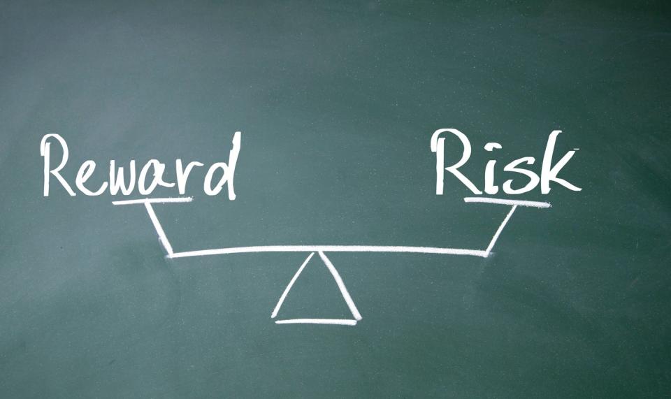 A scale showing risk and reward.