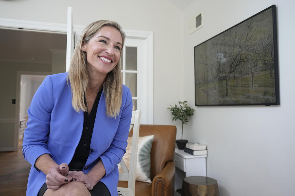 Nurse Practitioner and former Democratic candidate for the Virginia House of Delegates, Susanna Gibson, smiles during an interview at her home Wednesday Nov. 15, 2023, in Henrico, Va. (AP Photo/Steve Helber)