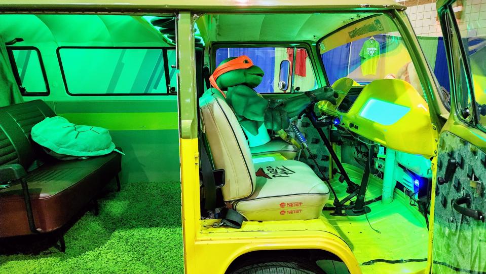 Inside the Teenage Mutant Ninja Turtle Van featuring custom Pizza Hut seats Saturday at AMA-CON at the Amarillo Civic Center.