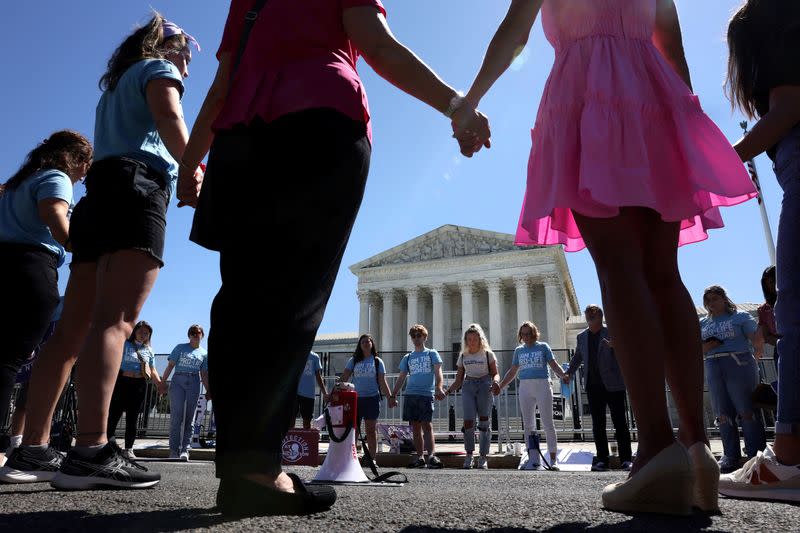 FILE PHOTO: Anti-abortion protestors pray outside of the Supreme Court in Washington