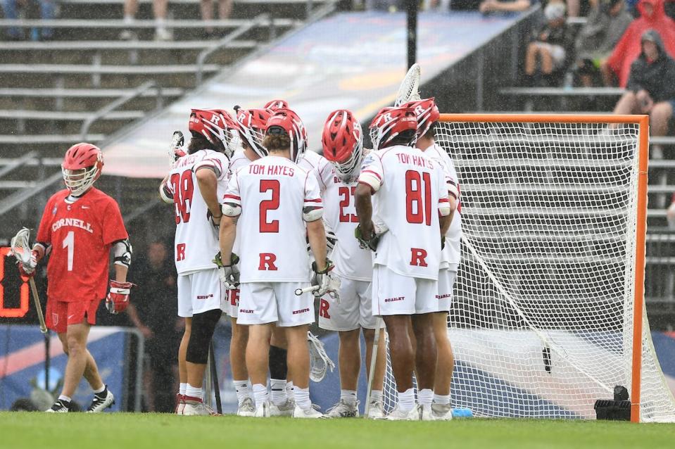 Rutgers men's lacrosse players talk during the Scarlet Knights' NCAA Tournament semifinal game against Cornell on Saturday.