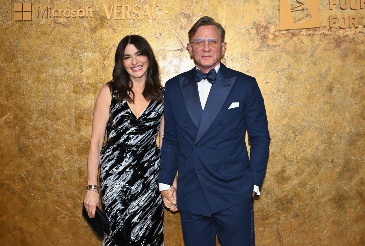 Daniel Craig and Rachel Weisz (AFP via Getty Images)