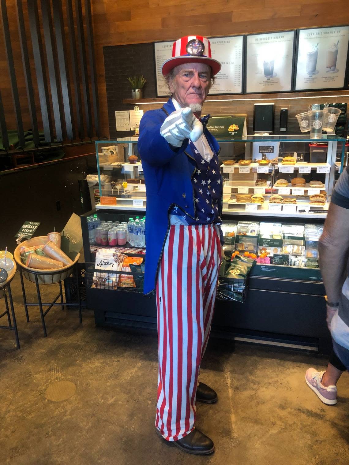 An unidentified man dresses up as Uncle Sam near the federal courthouse where Donald Trump was arraigned on June 13, 2023.