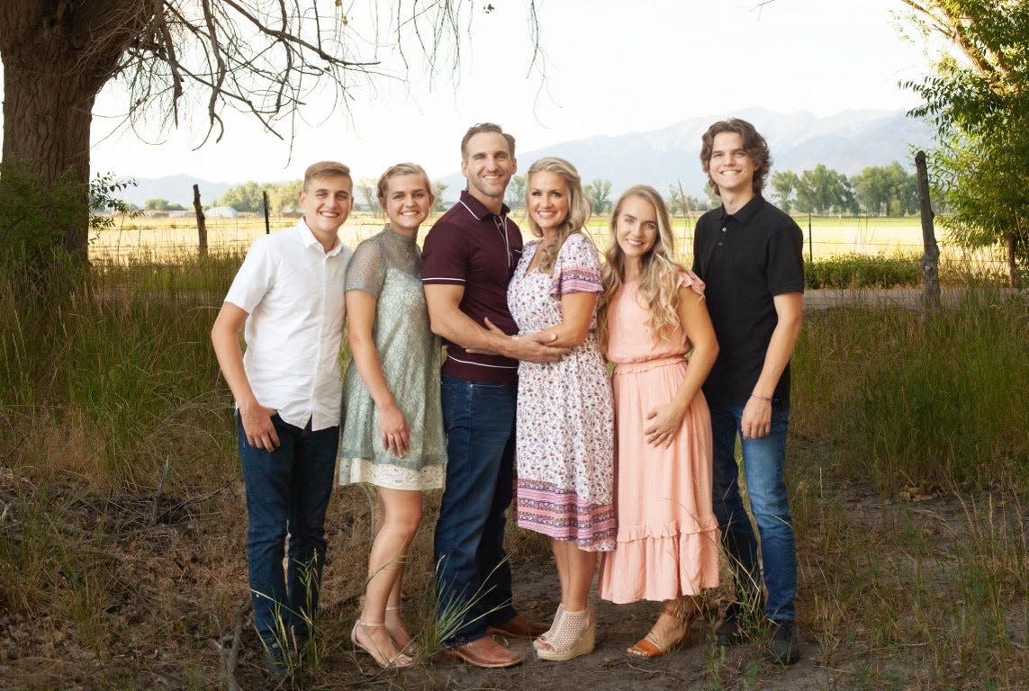 (Left to right) Langston, London, Joe, Kerry, Grace and Joseph Tegerdine of Springville, Utah in July 2022. Joseph Tegerdine, a former football and track athlete, was diagnosed with cancer in 8th grade after complaining of a sore knee.