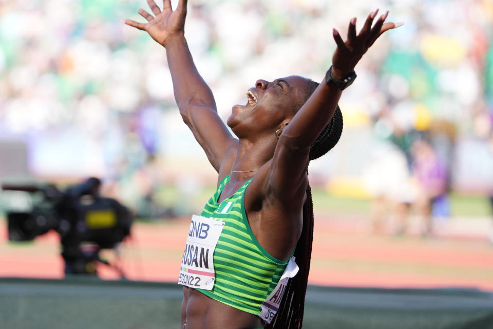 Jul 24, 2022; Eugene, Oregon, USA; Tobi Amusan (NGR) celebrates after setting a new world record in a qualifying heat of the women's 100m hurdles during the World Athletics Championships Oregon 22 at Hayward Field. Mandatory Credit: Kirby Lee-USA TODAY Sports