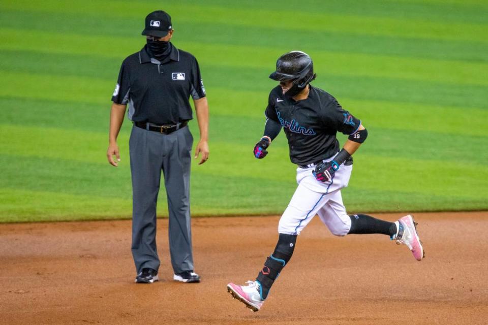 Miami Marlins short stop Miguel Rojas (19) runs the bases after homering on a fly ball to left center field in the first inning of a Major League Baseball game against the Washington Nationals at Marlins Park in Miami, Florida on Saturday, September 19, 2020.