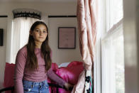 Scarlett Goddard Strahan, 11, poses for a portrait at her home on Tuesday, Aug. 20, 2024, in Sacramento, Calif. (AP Photo/Juliana Yamada)