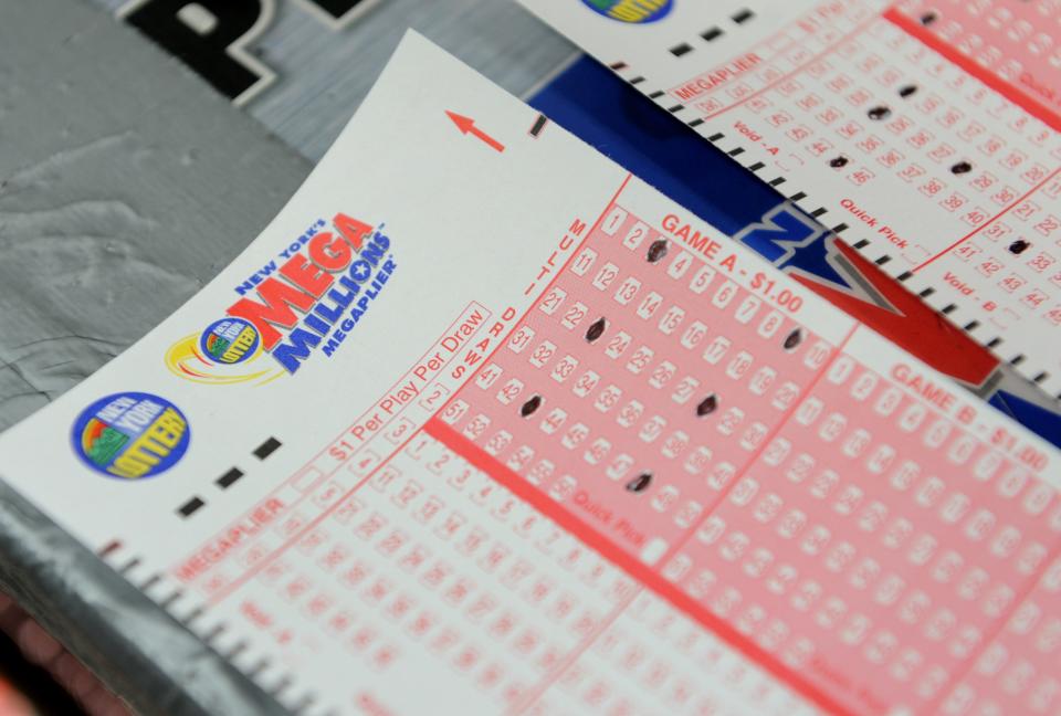 Mega Millions players buy their tickets for the Friday, May 3 drawing worth an estimated $284 million.