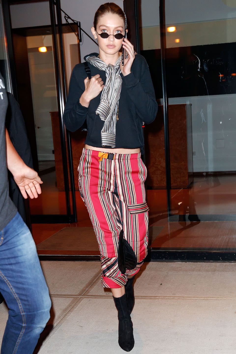 <p>In a ETRO top, RE/DONE striped pants and Stuart Weitzman boots in NYC.</p>