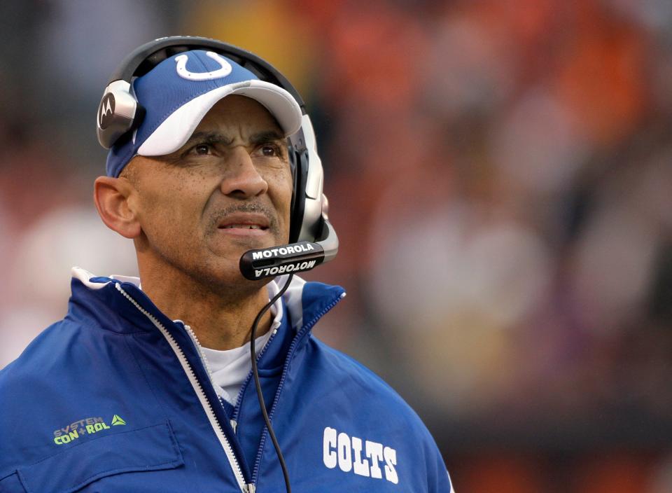 In this photo from 2008, Indianapolis Colts coach Tony Dungy watches from the sideline as his team plays the Cleveland Browns. He is the first African-American head coach to win a Super Bowl and has been a strong advocate for more diversity in coaching hires.