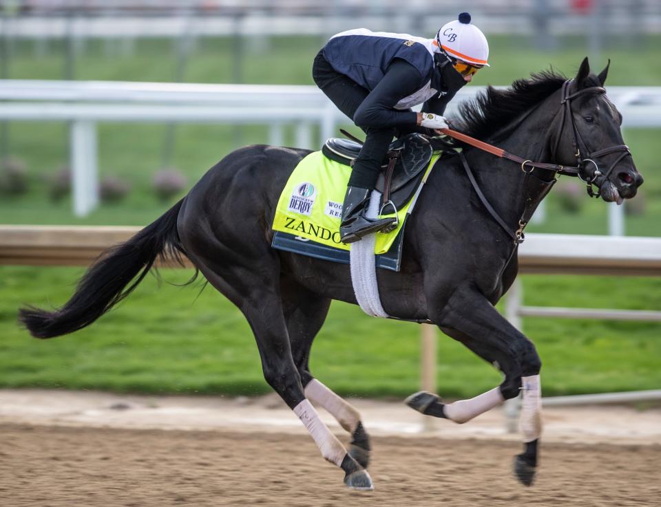 Kentucky Derby favorite Zandon gallops on the track at Churchill Downs. May 4, 2022
